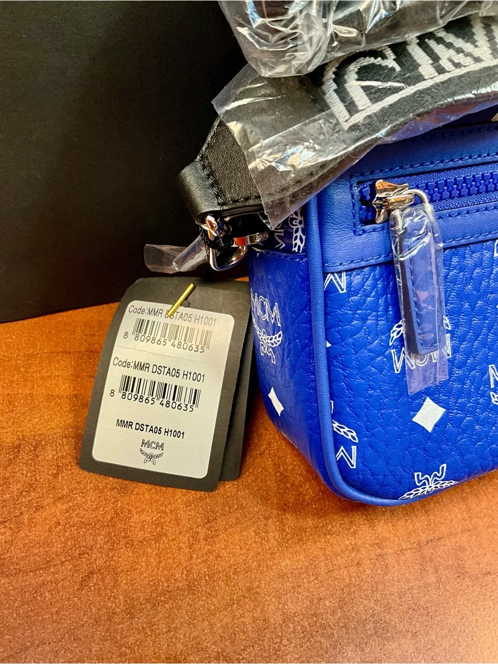 MCM Royal Blue Visetos Logo Messenger Bag, with Polished Metal Logo Plaque